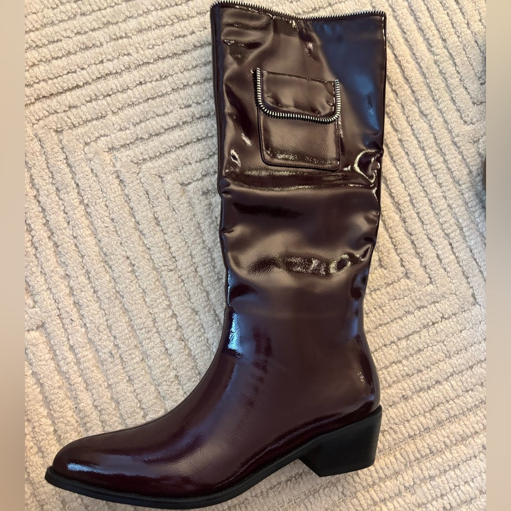 Unworn burgundy knee high boots